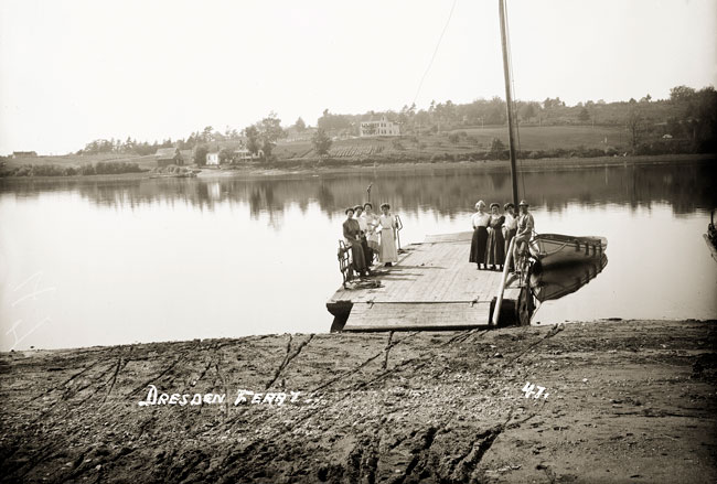 People on wooden ferry.