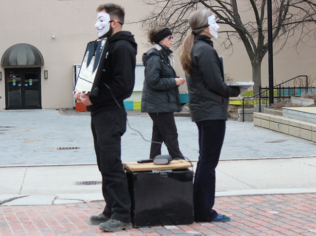 People holding monitors